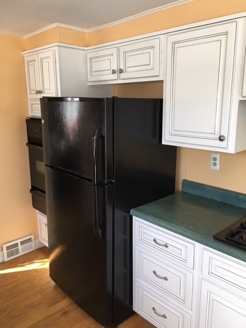 After view of new white cabinets