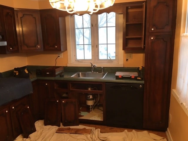 Before view of old brown cabinets