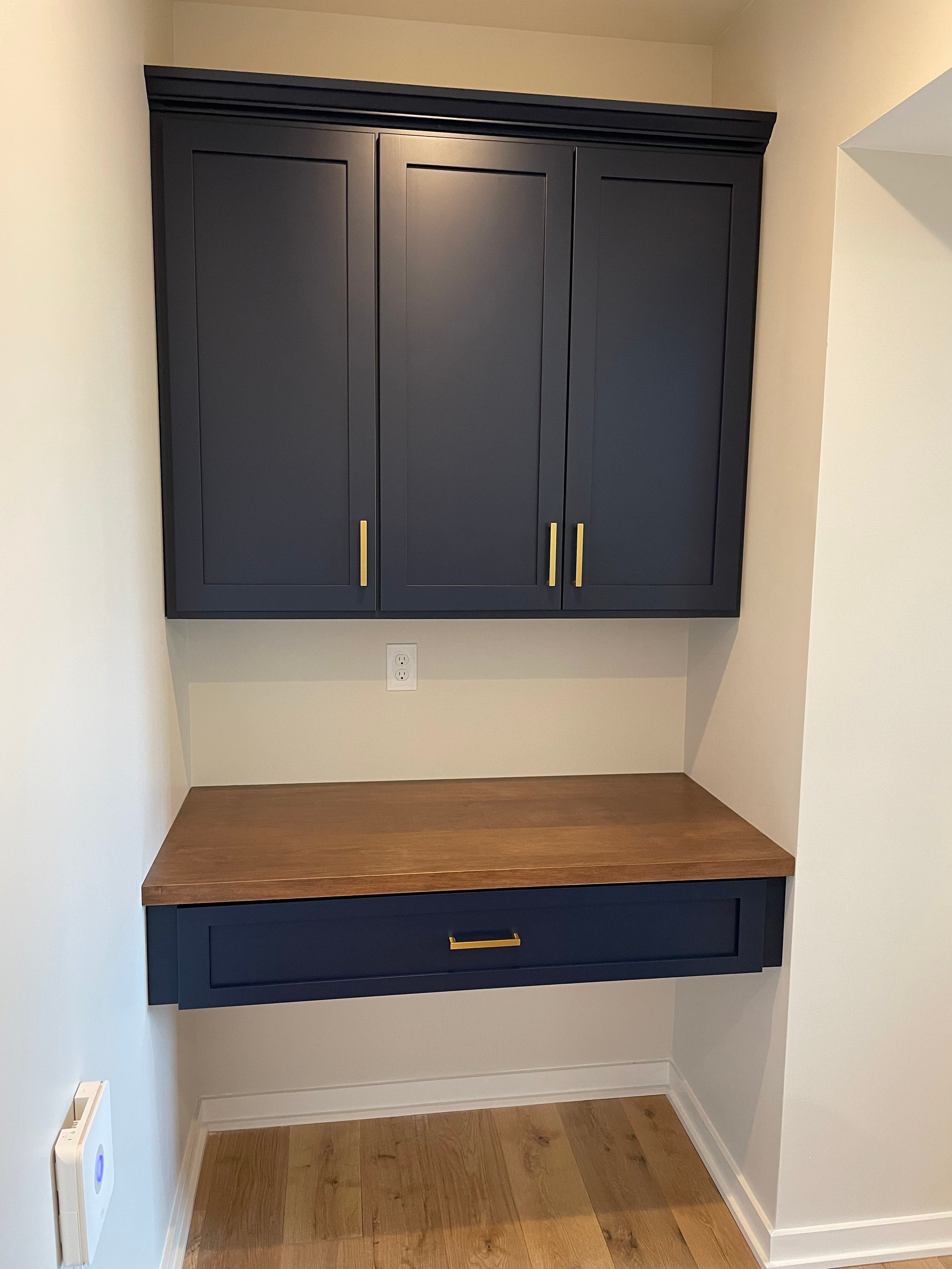 built-in cabinets and shelf/desk nook