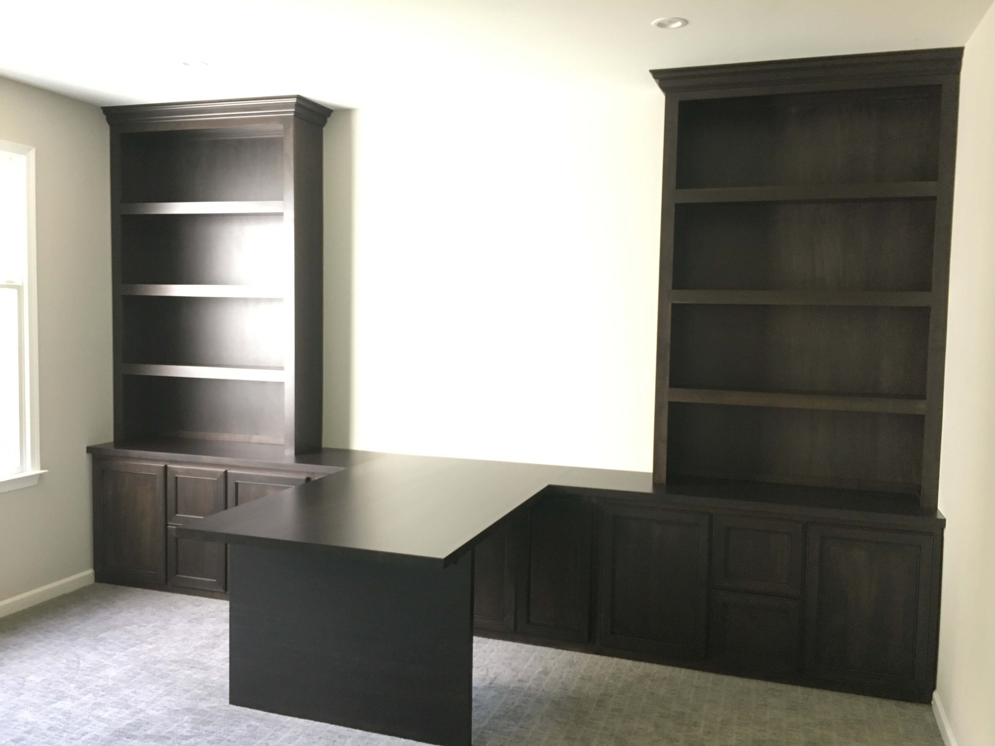 built in desk and cabinets