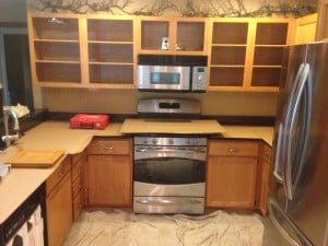 Before pic of old oak cabinets.